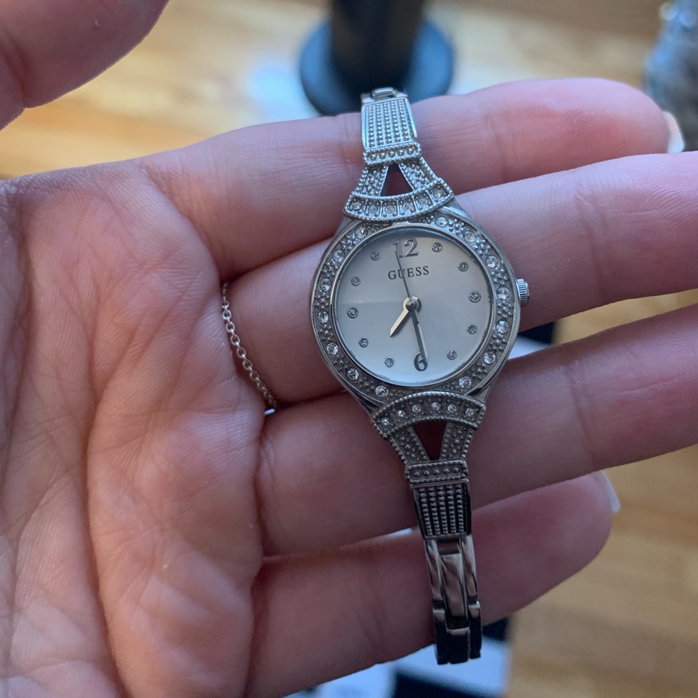 Guess watch, small face with decorative bracelet. Adjustable.